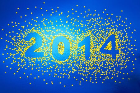 Christmas decoration of golden confetti starsの写真素材