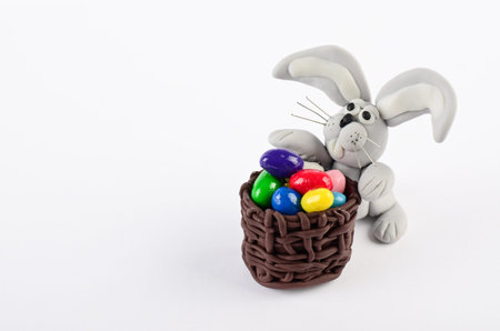Colorful easter eggs and rabbit isolated on white for decoration