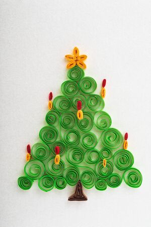 Paper Christmas tree decoration studio isolatedの写真素材