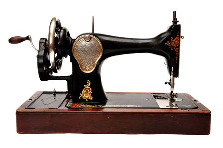 Old sewing machine isolated on white backgroundの写真素材