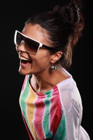 Portrait of beautiful young smiling woman isolatedの写真素材