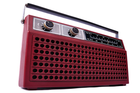 1980s retro radio isolated on white background with focus on the left sideの写真素材