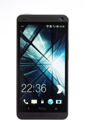 Varna, Bulgaria - June 19, 2013: Cell phone model HTC One has Super LCD3 capacitive touchscreen, 4 MP Camera, Quad-core 1.7 GHz and Android OS, v4.1.2. Announced 2013, February.のeditorial素材