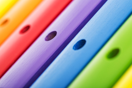 Rainbow colored wooden toy xylophoneの写真素材