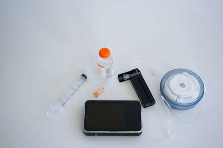 Insulin pump equipment includes infusion set, cartridge and insulin vial.の写真素材