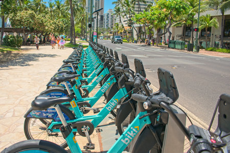 Waikiki, HI, USA - July 16, 2019: Bike rental station on Kalakaua Ave in Waikiki Beachのeditorial素材