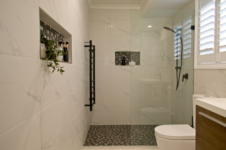 Luxury ensuite bathroom with plantation shutters - selective focusの写真素材