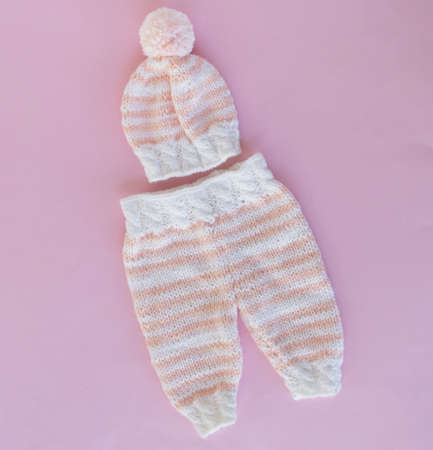 Knitted newborn pants and matching hatの写真素材