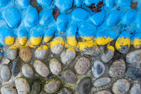 Cobblestone in three colors: yellow, blue and natural stone.の写真素材