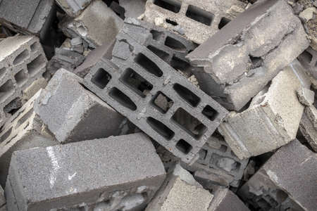 A mountain of concrete bricks arranged in bulk.の写真素材