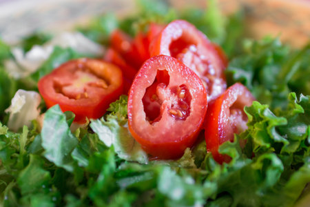 Simple salad with lettuce and cherry tomatoes.の写真素材