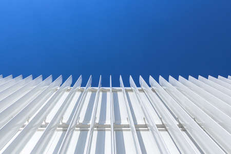 Bottom view of a facade of a building minimal styleの写真素材