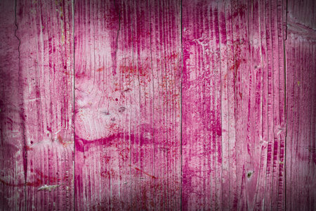 Background consisting of wooden planks painted pink.の写真素材