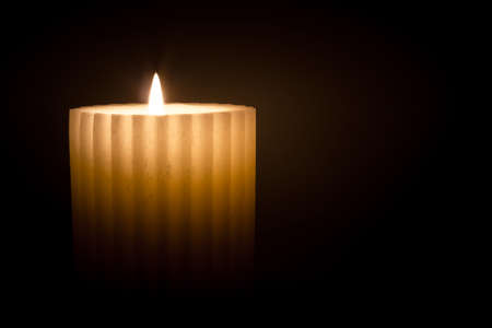 Christmas candle made with raw wax, wrapped in a soft atmosphere.の写真素材