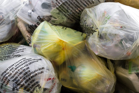 Big pile of garbage and waiste in transparent bags