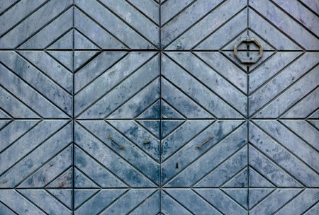Vintage wooden door figured rhombus light green pattern.