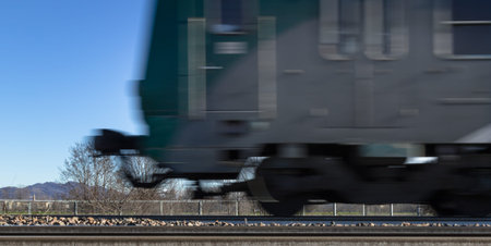 Photo blurred intentionally to show the motion of the train.