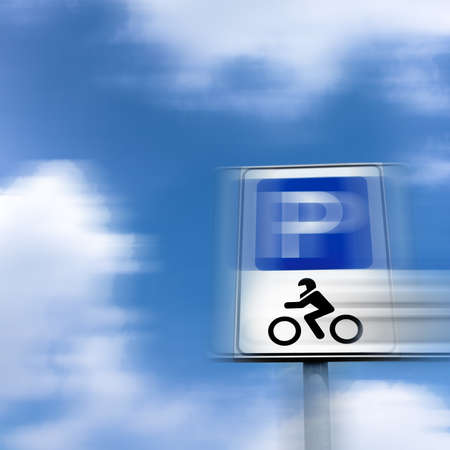 Road sign for parking motorbikes only, with motion blur.の写真素材