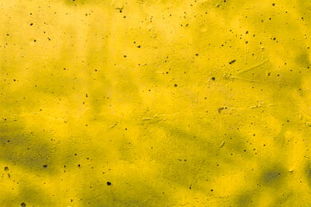 Abstract yellow background texture concrete wall.の写真素材