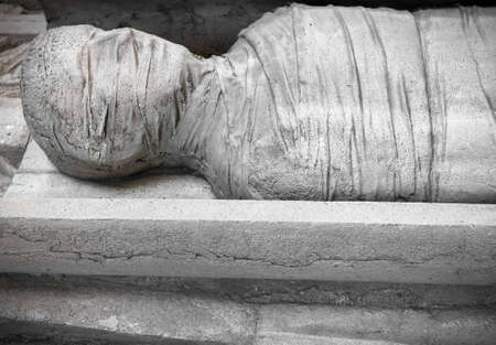 Stone statue of a mummy in a coffinの写真素材