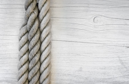 White empty wooden table of traveller with rope, top view.の写真素材