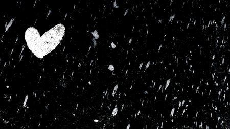 White heart painted on black backdrop with paint splatters everywhere. It can be used as a poster, wallpaper, design t-shirts. Fully editable.の写真素材