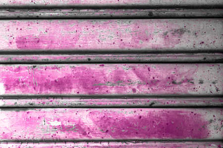 Closeup pink roller shutter texture/abstract background.の写真素材