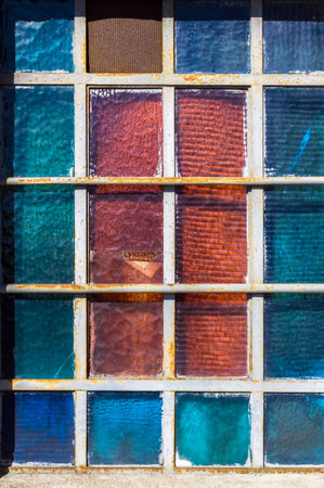 Vintage colorful stained glass window texture backgroundの写真素材