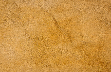 Mediterranean wall background, terracotta orange colored texture.の写真素材