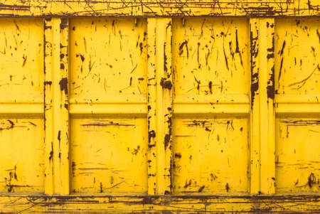 Closeup of a yellow rubble container. it can be used as backgroundの写真素材