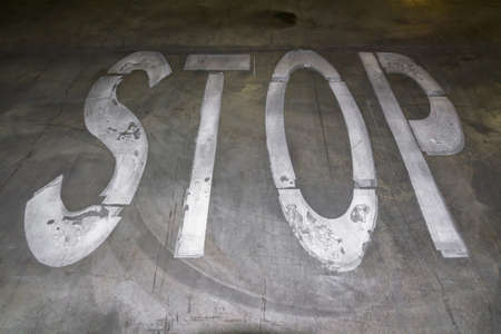 stop sign on the groundの写真素材