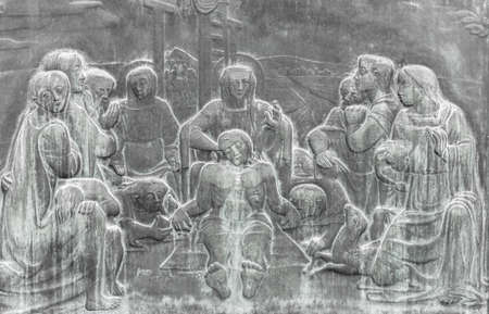 Stone wall engraving scene depicting the Lamentation of Christのeditorial素材