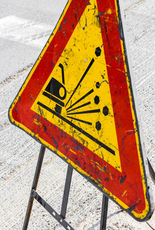 Signage - unstable material on the road.の写真素材