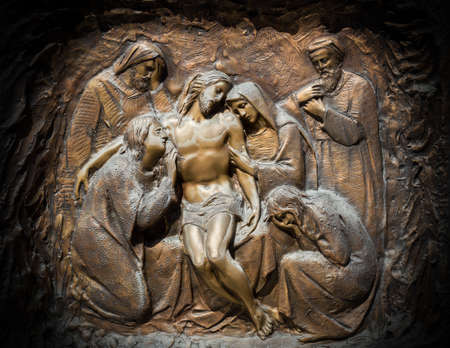Bronze wall engraving scene depicting the Lamentation of Christのeditorial素材