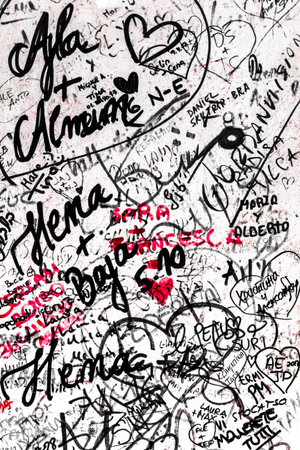 Wall full of messages from lovers. It can be used as a Valentine's theme, poster, wallpaper, design...