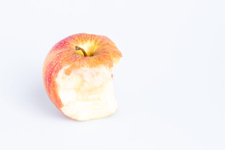 Red Delicious Apple on White Background. Bitten apple.