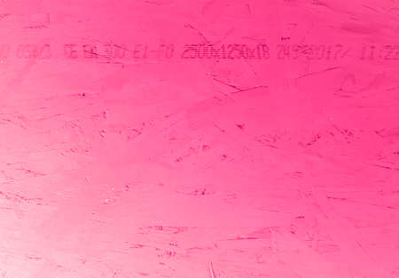 Abstract fuchsia background. Brushstrokes of color on a wall.の写真素材