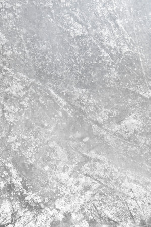 Ice rink floor, detail of a textured background ice. Sports and seasons.
