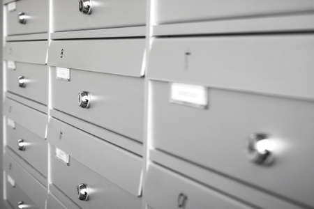 Aluminum mail boxes. Ideal for concepts such as safety and security, business communication and more. Shallow DOF.の写真素材