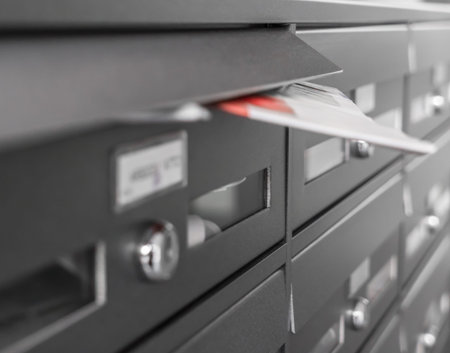 Modern metal Gray Mailboxes. They can be used for background and concepts. Selective focus.
