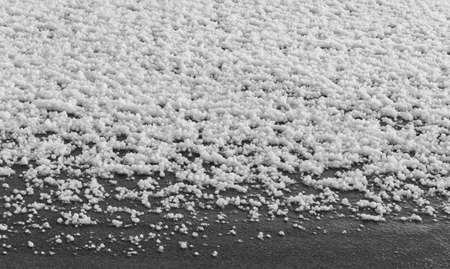 Hailstones on the ground after the stormの写真素材