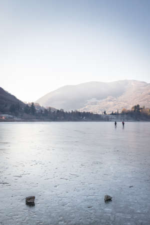 People skating on the Endine frozen lake. Endine Gaiano (BG) ITALY - January 22, 2019.のeditorial素材