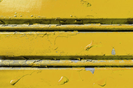 Background of old metal sheet with peel paint texture surface. Painted metal roller shutters door...
