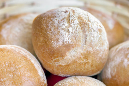 Home baked bread buns stacked in battery operated