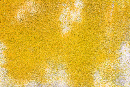 Yellow concrete wall for textures and backgroundの写真素材