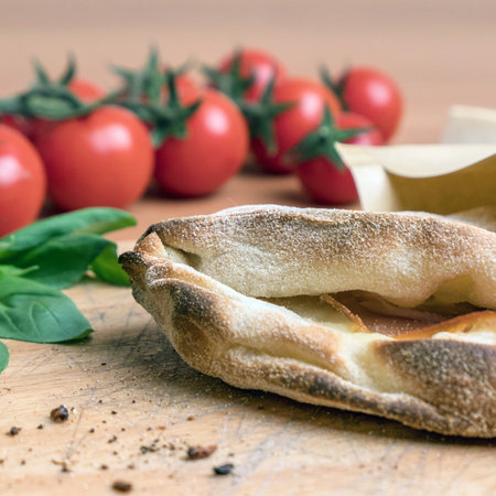 Pinsa romana and scrocchiarella gourmet italian cuisine. Traditional dish in Italy.の写真素材