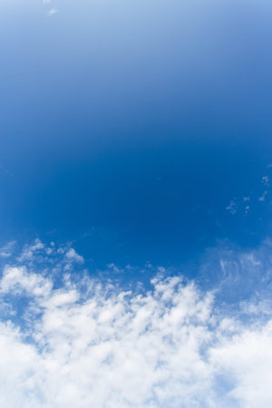 Sky with white clouds. Ideal for textures and backgrounds. Space for text.