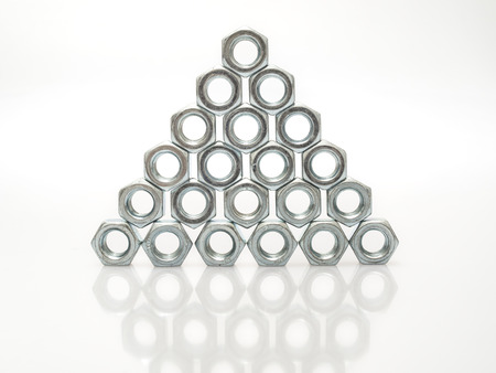 Metalware with thread on a white background with reflectionの写真素材