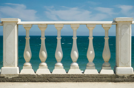 Balustrade on the Black Sea embankment. Beach front of the sea.の写真素材