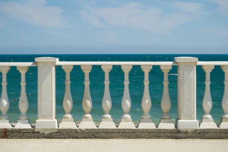 Balustrade on the Black Sea embankment. Beach front of the sea.の写真素材